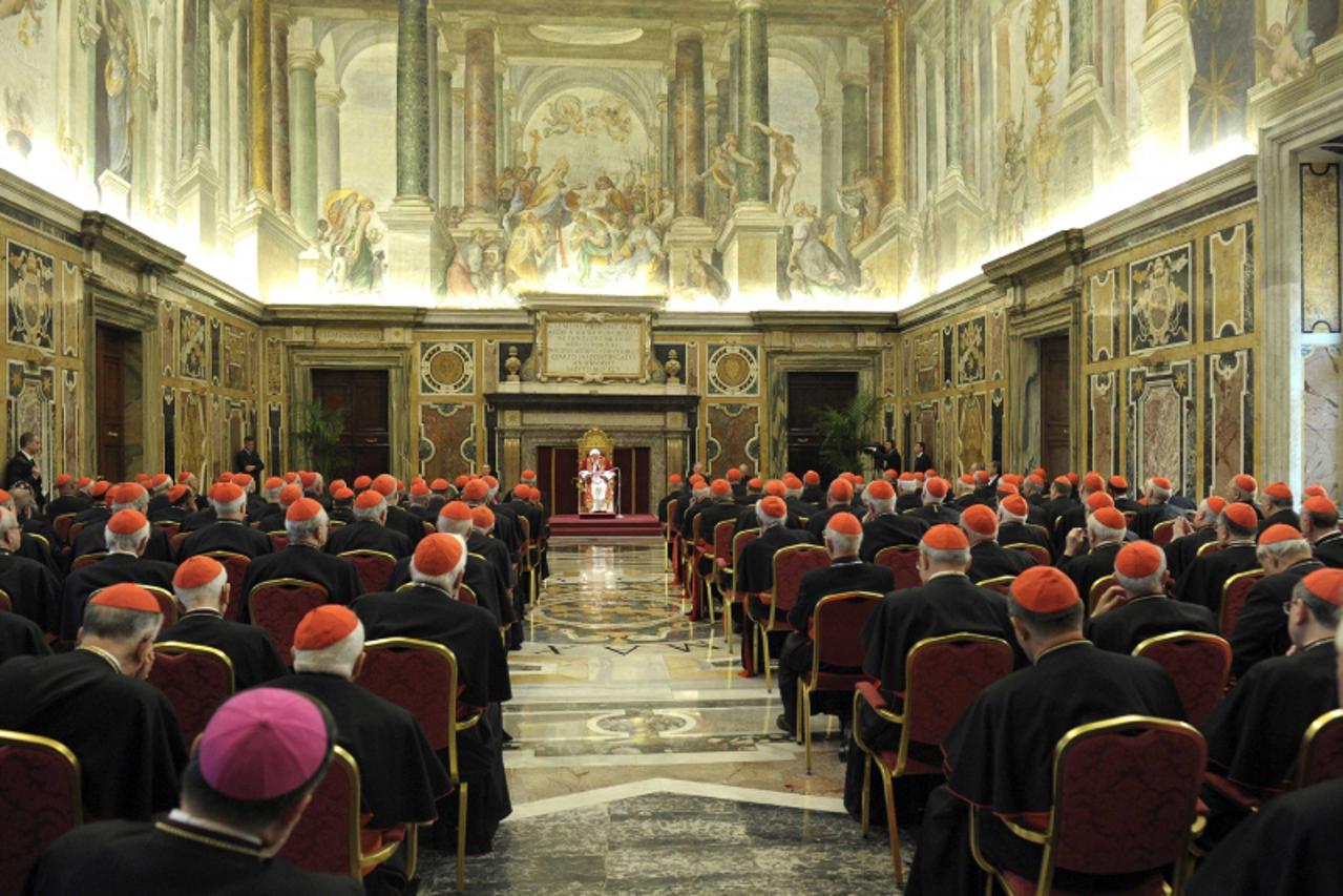 'Pope Benedict XVI addresses during the last meeting with the Cardinals at the Vatican, February 28, 2013.  REUTERS/Osservatore Romano  (VATICAN - Tags: RELIGION) ATTENTION EDITORS - THIS IMAGE WAS PR