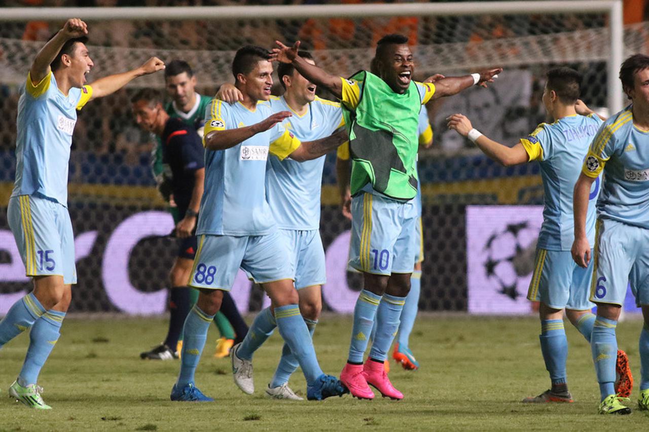 NICOSIA, CYPRUS - AUGUST 26: FC Astana's players celebrate after advancing to the UEFA Champions League group stage after the Qualifying Round Play Off Seconnd Leg match between APOEL Nicosia and FC Astana at GSP stadium on August 26, 2015 in Nicosia, Cyp