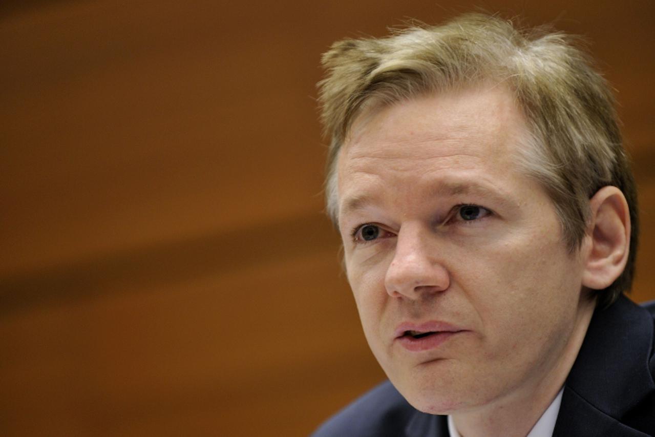 '(FILES) -- A file photo taken on November 4, 2010 shows Wikileaks founder Julian Assange attending a press conference at the Geneva Press Club in Geneva.  The global police agency INTERPOL said on De