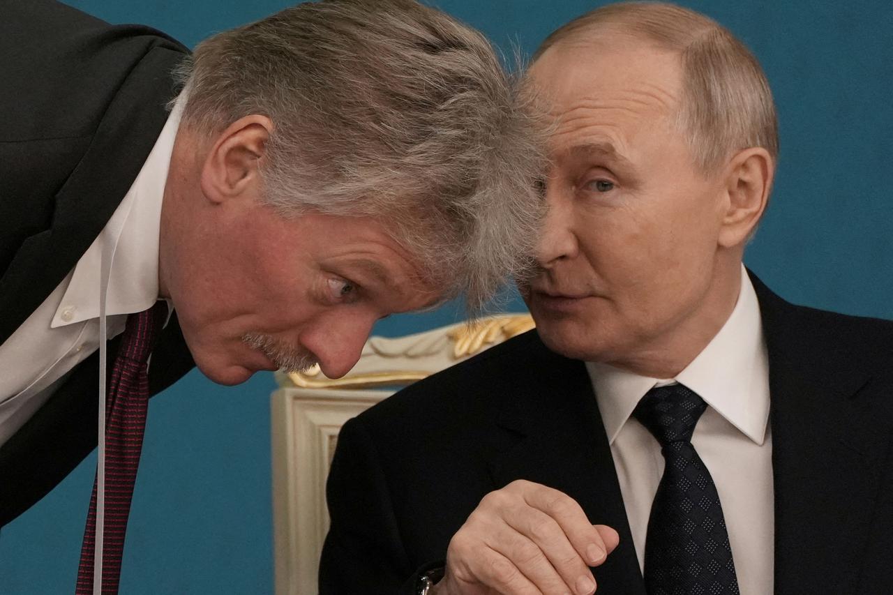 Dmitrij Peskov i Vladimir Putin