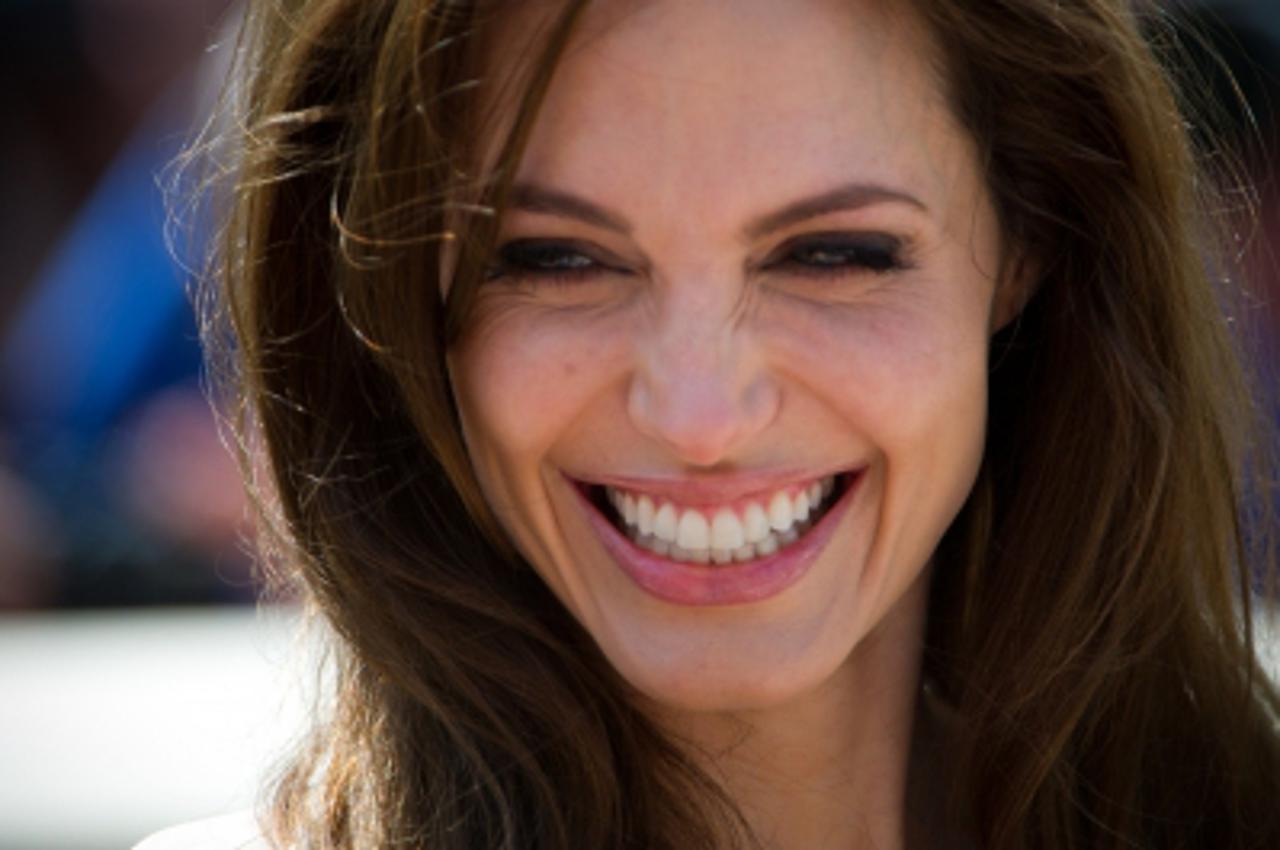 'US actress Angelina Jolie poses during the photocall of Kung-Fu Panda 2 at the 64th Cannes Film Festival on May 12, 2011 in Cannes. AFP PHOTO / MARTIN BUREAU'