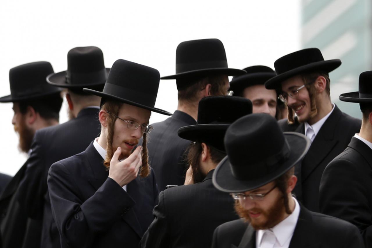 'Orthodox Jews gather outside the European Union Council building in Brussels during a protest in support of the Orthodox Jewish community in Israel July 1, 2013.  REUTERS/Francois Lenoir (BELGIUM - T
