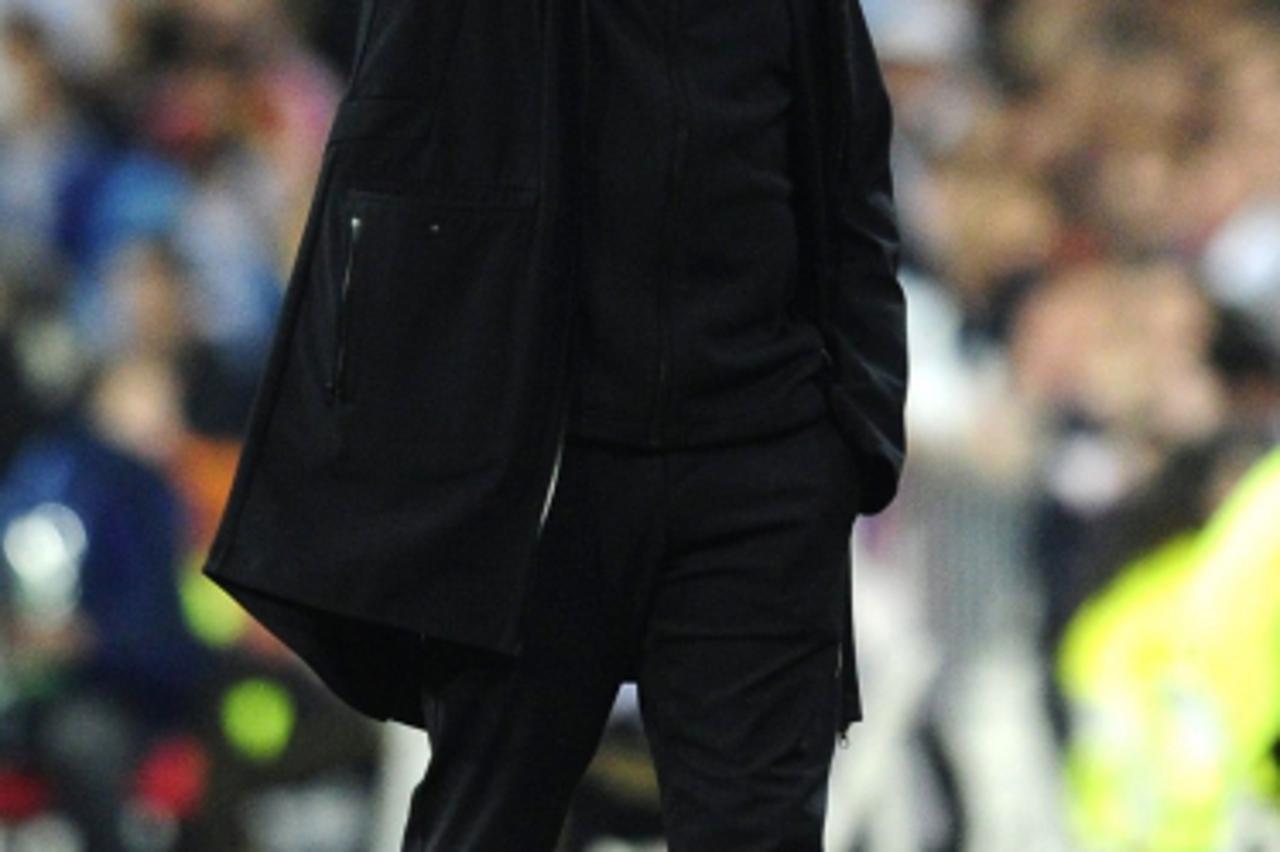'Real Madrid\'s Portuguese coach Jose Mourinho gestures during the UEFA Champions League second leg semi-final football match Real Madrid against Bayern Munich  at the Santiago Bernabeu stadium in Mad