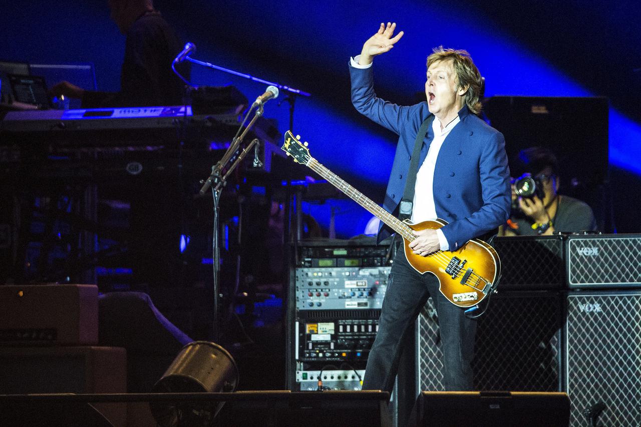 Paul McCartney performs at the Roskilde festival in Denmark July 4, 2015. REUTERS/Jens Noergaard Larsen/Scanpix Denmark  ATTENTION EDITORS - THIS PICTURE WAS PROVIDED BY A THIRD PARTY. THIS PICTURE IS DISTRIBUTED EXACTLY AS RECEIVED BY REUTERS, AS A SERVI