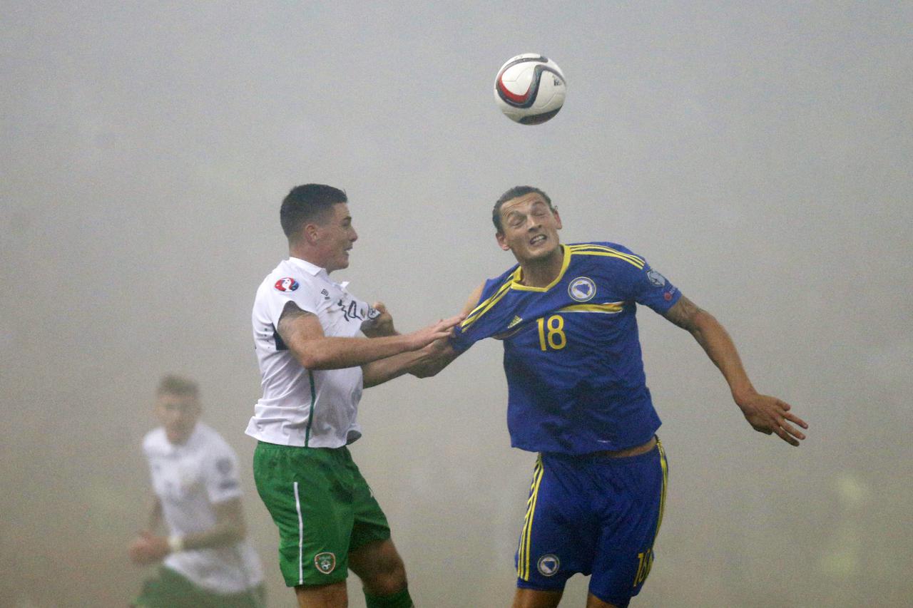 Football - Bosnia  Herzegovina v Republic of Ireland - UEFA Euro 2016 Qualifying Play-Off First Leg - Stadion Bilino Polje, Zenica, Bosnia  Herzegovina - 13/11/15 Republic of Ireland's Ciaran Clark in action with Bosnia's Milan Djuric Reuters / Dado Ruvic
