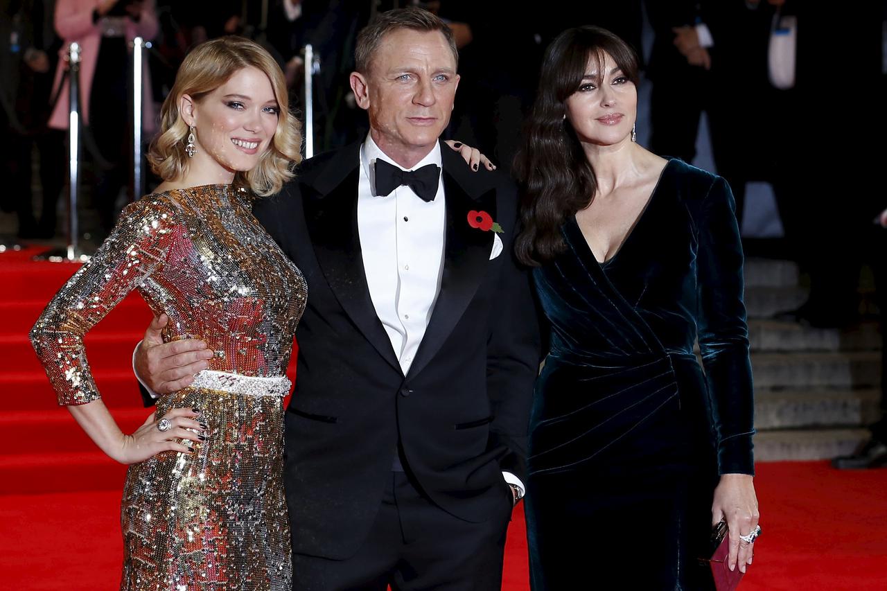 (L to R) Lea Seydoux, Daniel Craig and Monica Bellucci pose for photographers as they attend the world premiere of the new James Bond 007 film 