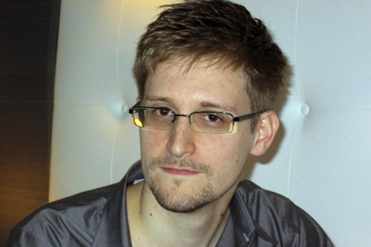 'U.S. National Security Agency whistleblower Edward Snowden, an analyst with a U.S. defence contractor, is pictured during an interview with the Guardian in his hotel room in Hong Kong June 9, 2013. T