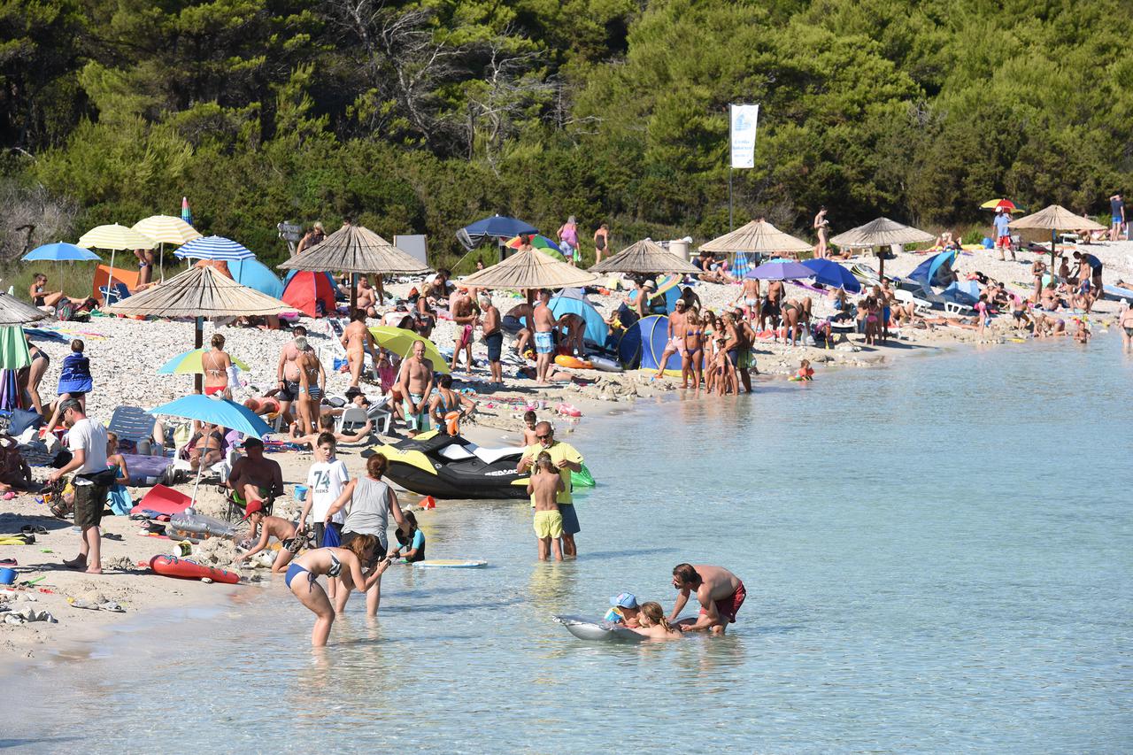 20.08.2015., Dugi otok - Sakarun je prostrana pjescana plaza duga oko 800 m, otvorena prema juznoj pucini Jadrana. Photo: Dino Stanin/PIXSELL