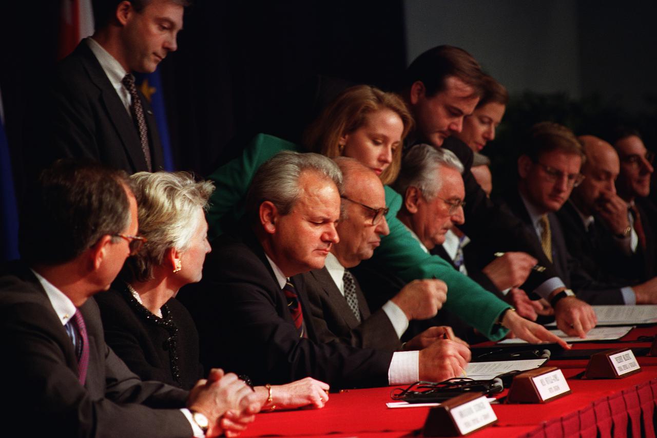 WRIGHT-PATTERSON AFB, OHIO, Nov. 21, 1995 -- President Slobodan Milosevic of the Federal Republic of Yugoslavia, President Alija Izetbegovic of the Republic of Bosnia-Herzegovina, and President Franjo Tudjman of the Republic of Croatia sign the Dayton Pea