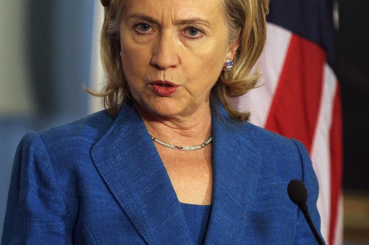 \'US Secretary of State Hillary Clinton holds a news briefing with Australian Foreign Minister Kevin Rudd (unseen) after meeting at the State Department in Washington on September 17, 2010.       AFP 