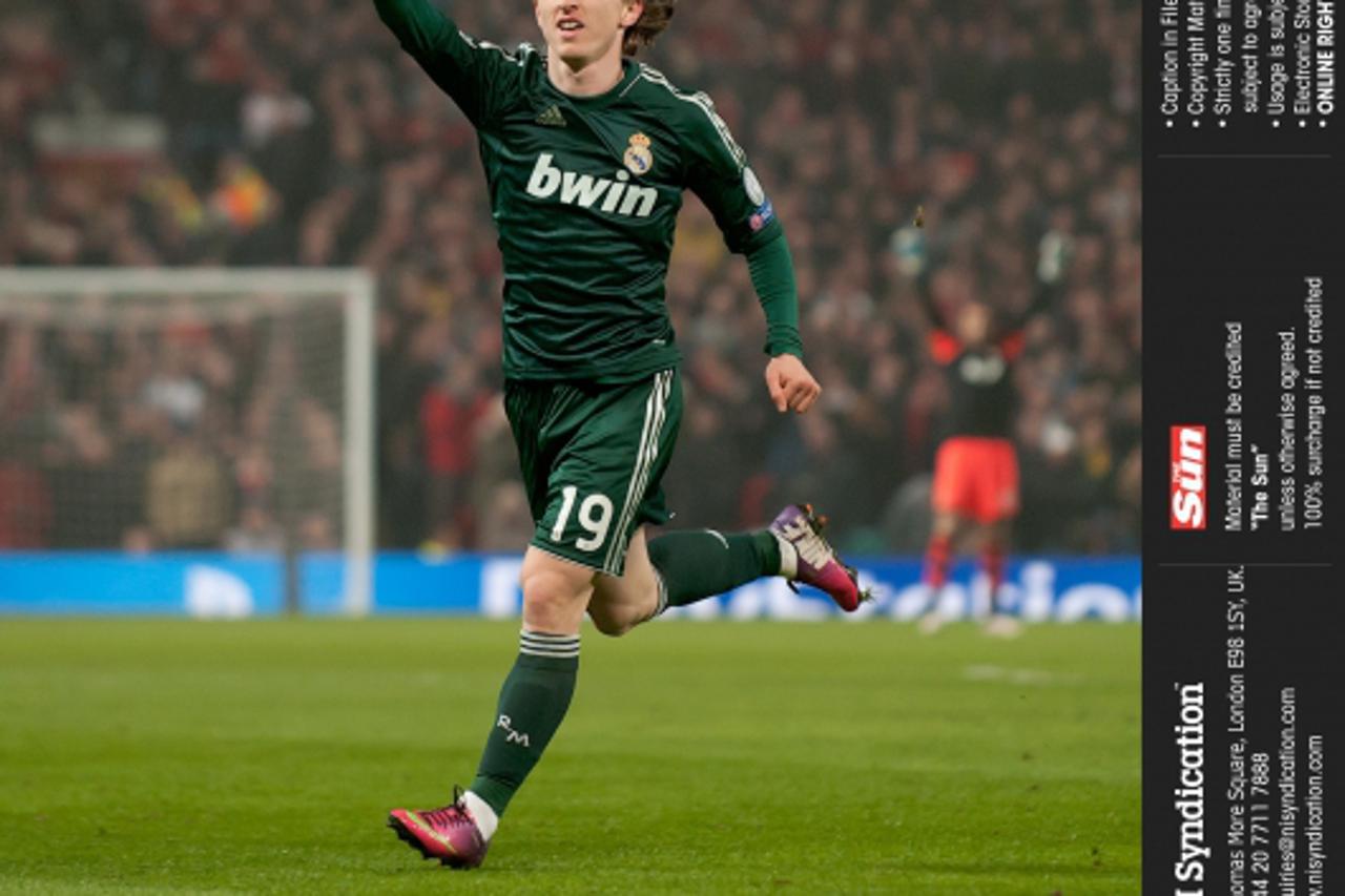 'Manchester United v Real Madrid, Champions League Last 16, 2nd leg. 5th March 2013. Real Madrid's Luka Modric scores and celebrates scoring real mad rids 1st goal Credit: The Sun Online rights must 