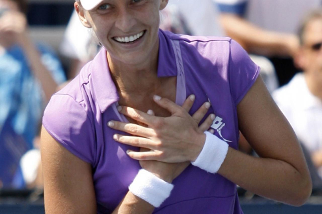 'Mirjana Lucic of Croatia reacts after her victory against Alicia Molik of Australia during the U.S. Open tennis tournament in New York, August 31, 2010. REUTERS/Eduardo Munoz (UNITED STATES - Tags: S