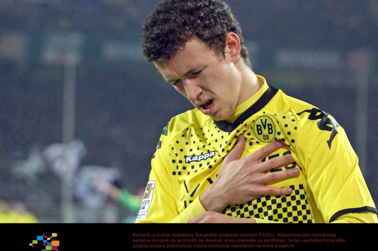 'Dortmund's Ivan Perisic celebrates his 3-1 goal during the German Bundesliga match between Borussia Dortmund and Hannover 96 at the Signal Iduna Park in Dortmund, Germany, 26 February 2012. Photo: K