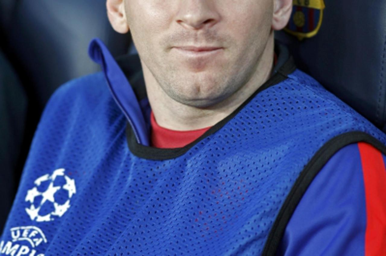 'Barcelona's Lionel Messi sits on the bench before the Champions League semi-final second leg soccer match against Bayern Munich at Camp Nou stadium in Barcelona May 1, 2013.  REUTERS/Gustau Nacarino