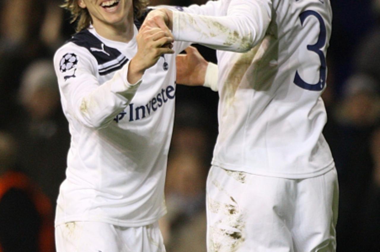 \'Tottenham Hotspur\'s Luka Modric (left) celebrates after scoring his side\'s second goal of the game with team mate Gareth Bale Photo: Press Association/Pixsell\'