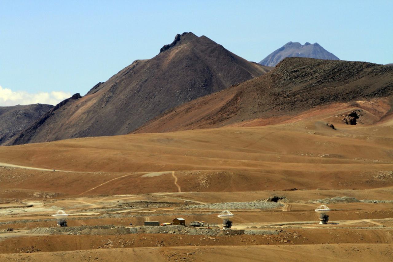 'A view of parabolic antennas of the ALMA (Atacama Large Millimetre/Submillimetre Array) project at the El Llano de Chajnantor in the Atacama desert, some 1730 km (1074 miles) north of Santiago and 50