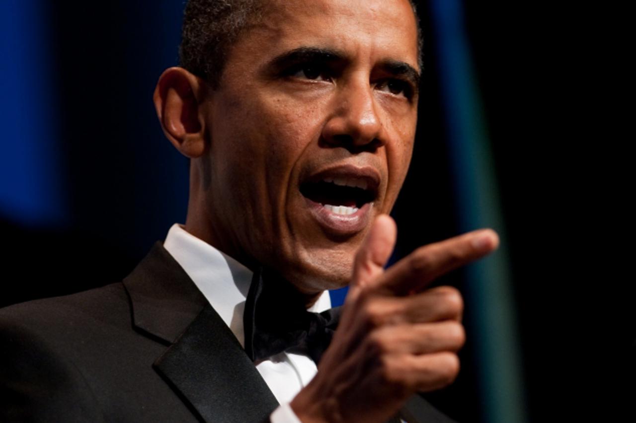 'US President Barack Obama addresses the annual Congressional Black Caucus Foundation Phoenix Awards dinner in Washington on September 18, 2010.        AFP PHOTO/Nicholas KAMM'