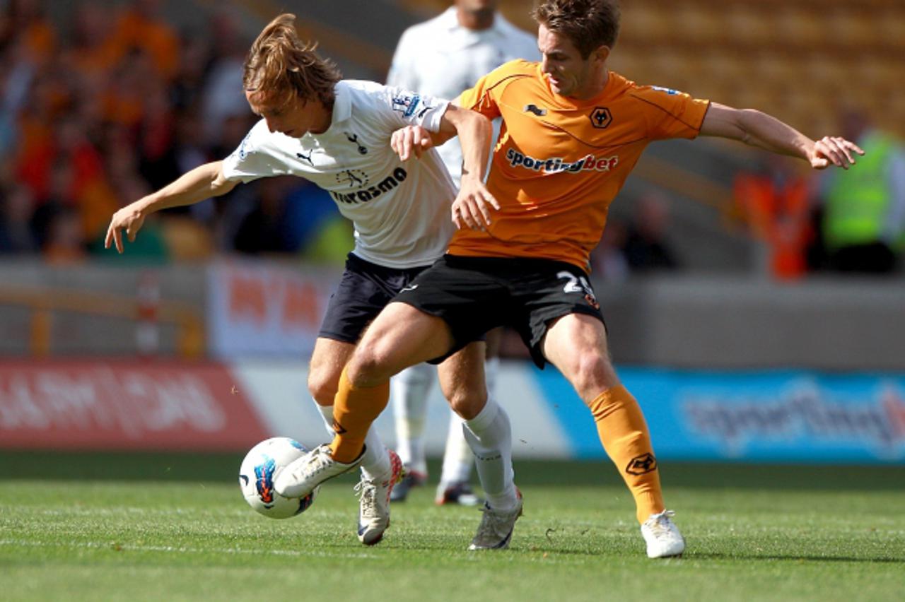 \'Tottenham Hotspur\'s Luka Modric (left) and Wolverhampton Wanderers\' Kevin Doyle (right) in action Photo: Press Association/Pixsell\'