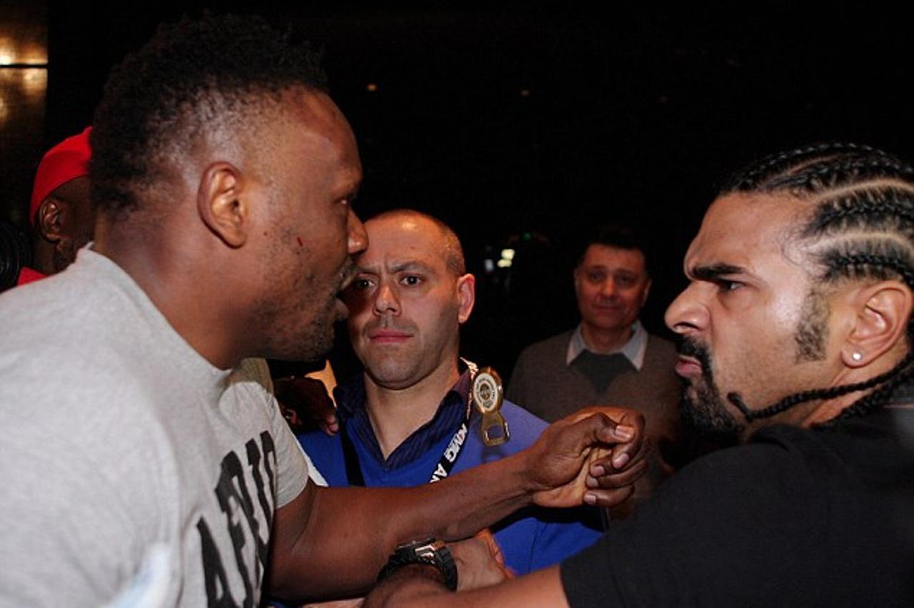 'Boxing - Vitali Klitschko v Dereck Chisora WBC Heavyweight Title - Olympic Hall, Munich, Germany - 18/2/12  Dereck Chisora (L) exchages blows with David Haye during the post fight press conference  M
