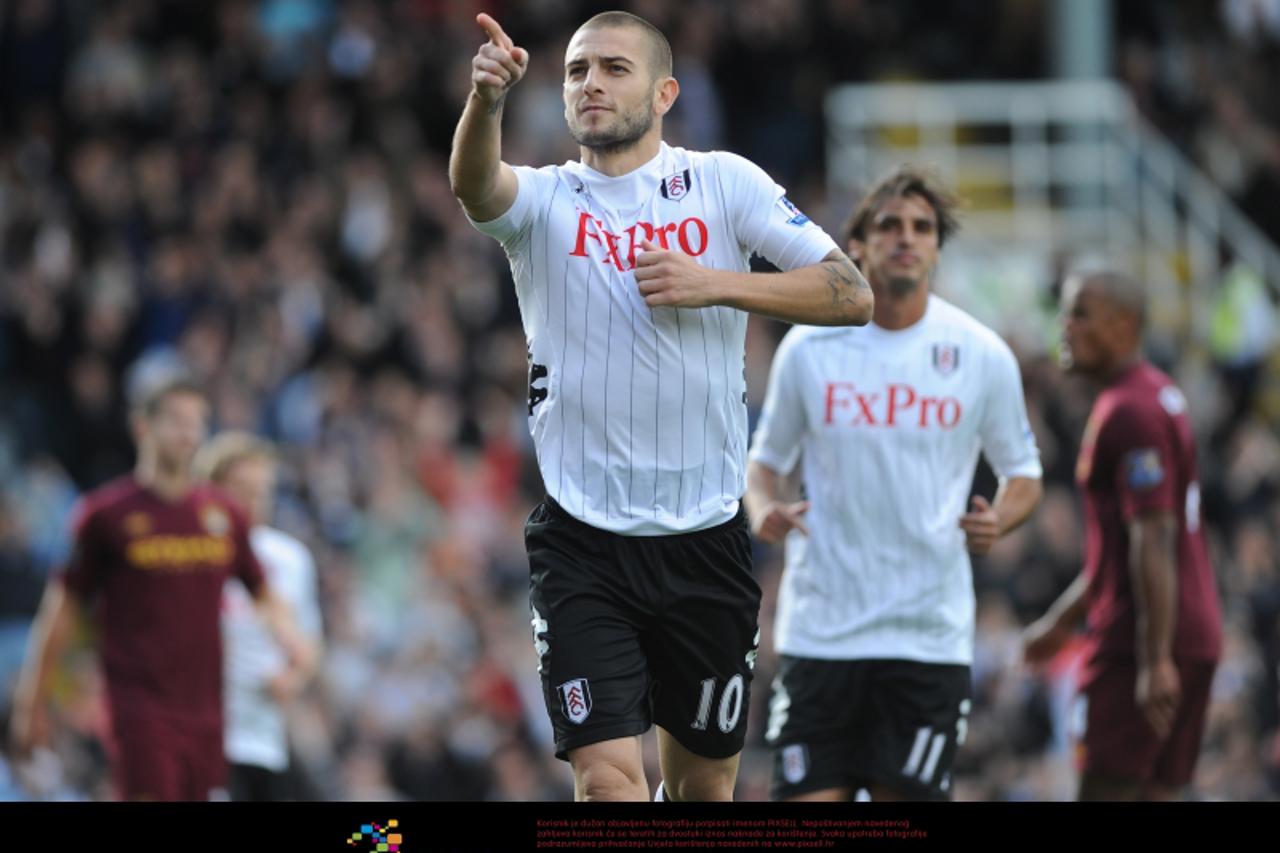 'Fulham's Mladen Petric celebrates his goal Photo: Press Association/Pixsell'