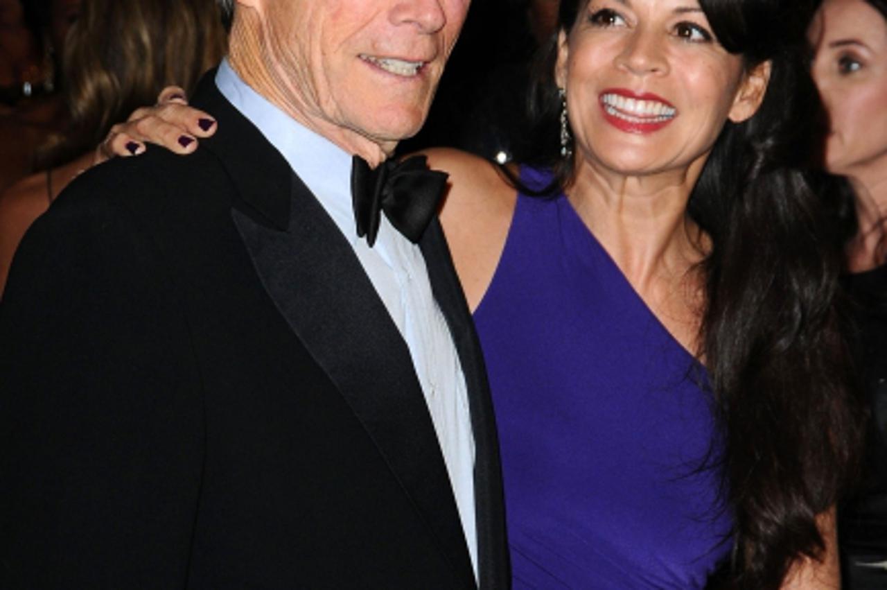 'Clint Eastwood and wife Dina attending the Academy of Motion Pictures Arts and Sciences Present the 2010 Governors Awards in the Grand Ballroom at Hollywood and Highland in Los Angeles, USA. Photo: P