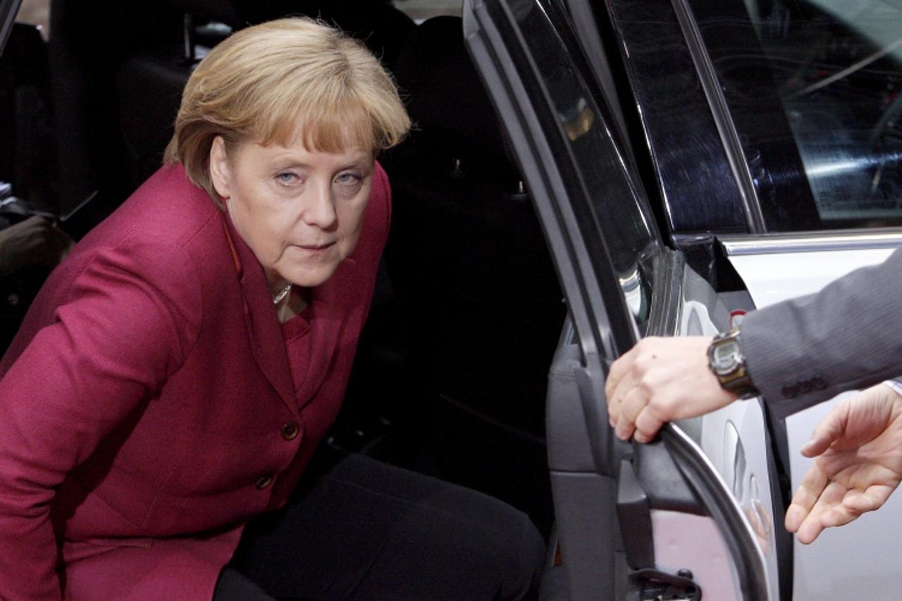 'German Chancellor Angela Merkel arrives at an European Union leaders summit in Brussels, March 26, 2010. Euro zone leaders agreed on Thursday to create a joint financial safety net with the IMF to he