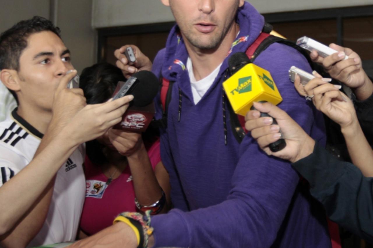 'Italian soccer player Marco Materazzi of Inter Milan arrives at Tocumen international airport in Panama City July 7, 2010. Materazzi will take part in a friendly game with Argentine soccer player Lio