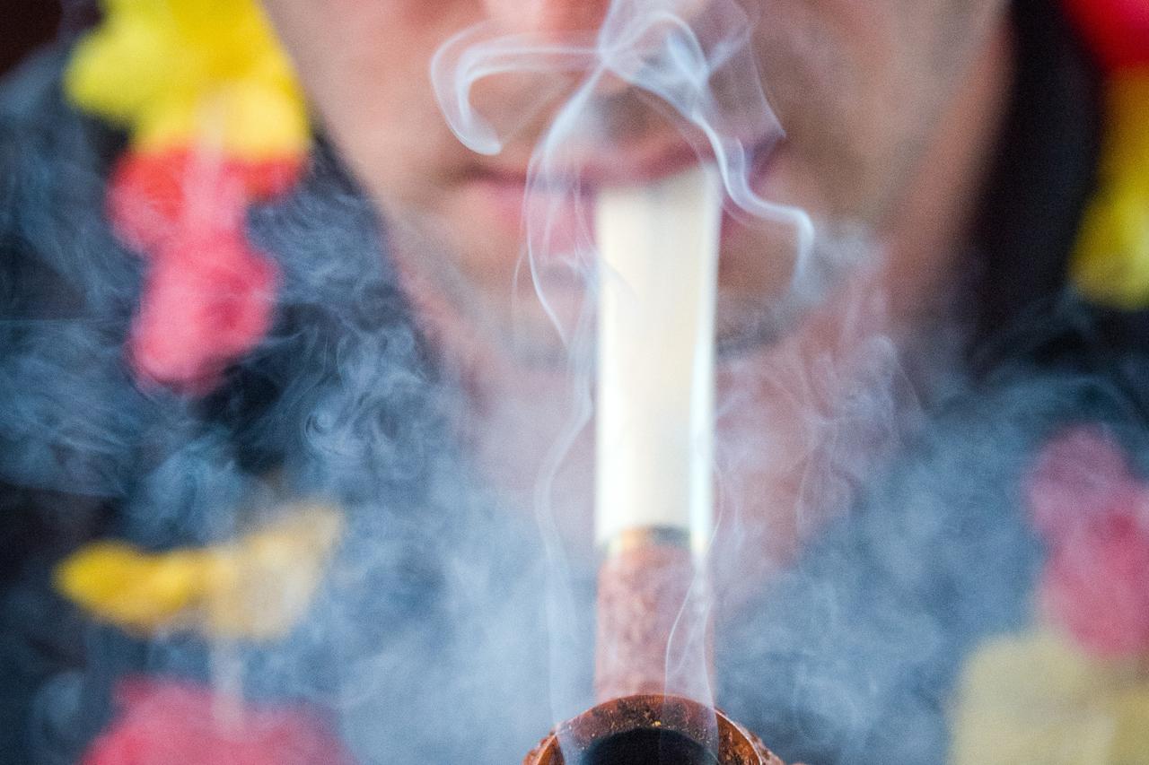 Members of the Pipe-Club-Wriezen competing in smoking a pipe as slow as possible, Wriezen, Germany, 21 June 2016. All members receive one pipe, three gramms of tobacco, a stodger and two matches with which they have to light the pipe within one minute. Pr