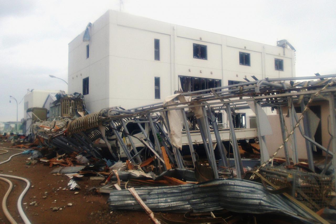 \'A handout photo from Japan\'s Nuclear and Industrial Safety Agency shows damage to the new service building at Tokyo Electric Power Co.\'s Fukushima Daiichi Nuclear Power Plant in Tomioka, Fukushima