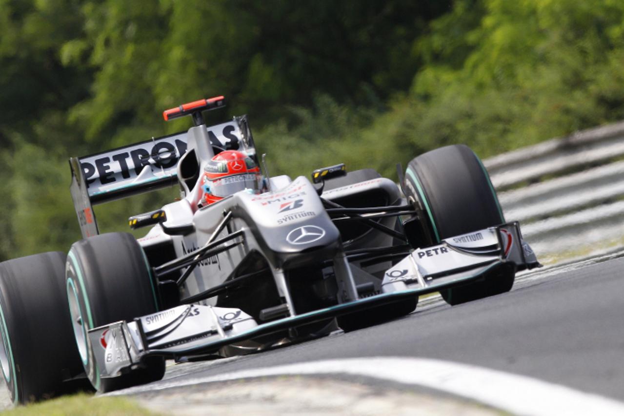 'Mercedes Formula One driver Michael Schumacher of Germany drives his car during the third practice session for the Hungarian F1 Grand Prix at the Hungaroring circuit near Budapest July 31, 2010.  REU