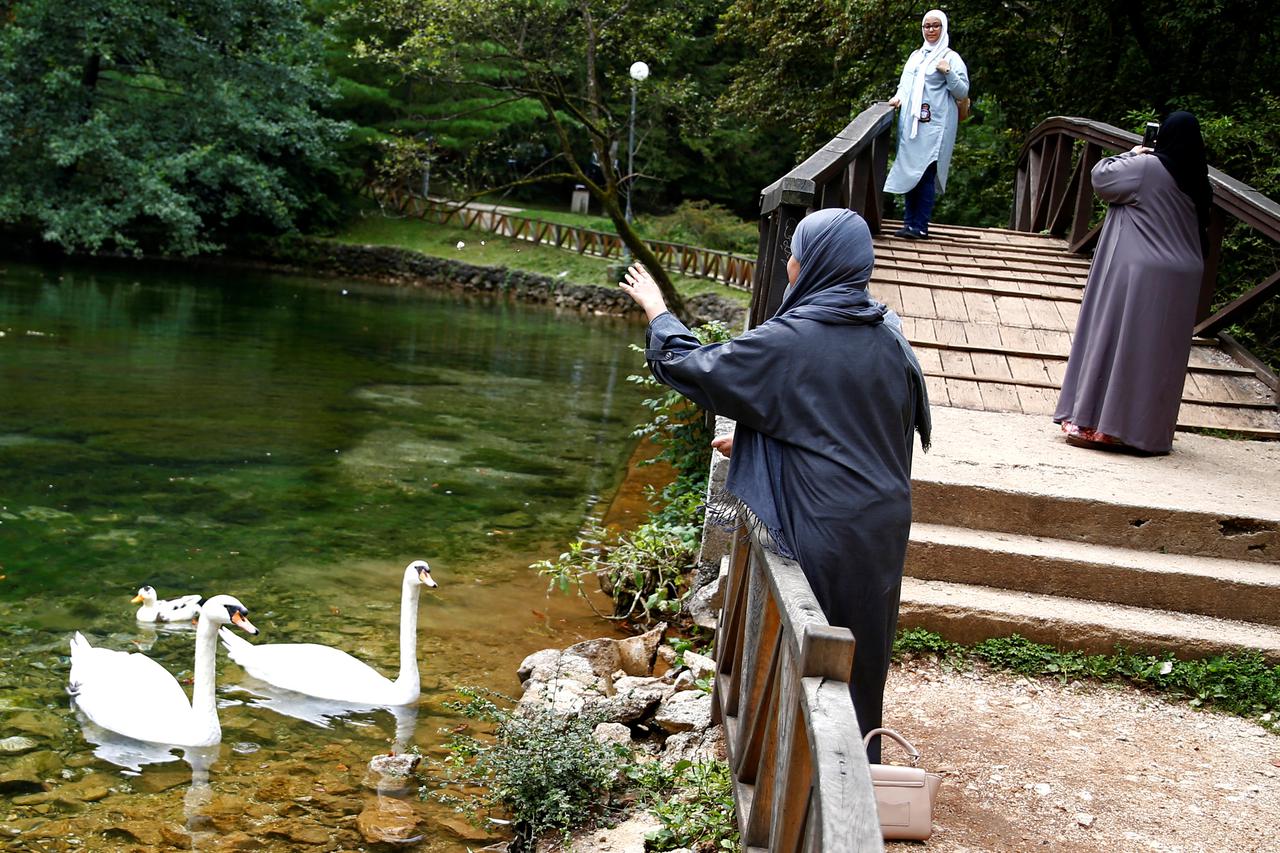Tourists from the Middle East enjoy at Vrelo Bosne nature park in Ilidza near Sarajevo, Bosnia and Herzegovina, August 19, 2016. Picture taken August 19, 2016. REUTERS/Dado Ruvic