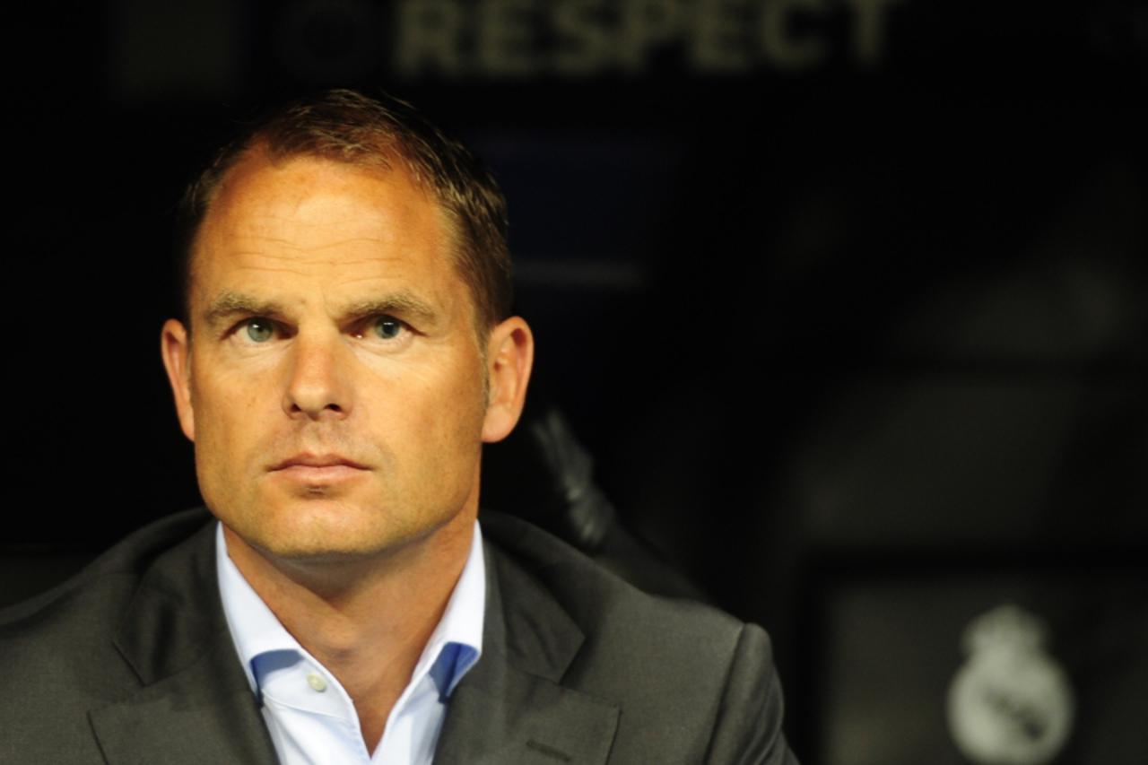 'Ajax Amsterdams coach Frank De Boer is pictured during the Champions League football match between Real Madrid and Ajax at the Santiago Bernabeu stadium in Madrid on September 27, 2011.    AFP PHOTO