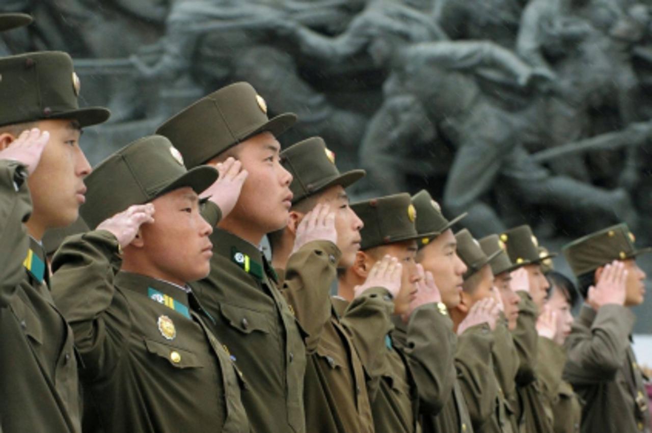 'North Korean soldiers salute at Mansudae in Pyongyang, in this photo taken by Kyodo April 25, 2012, during a ceremony to mark the 80th anniversary of the founding of the Korean People\'s Army. North 