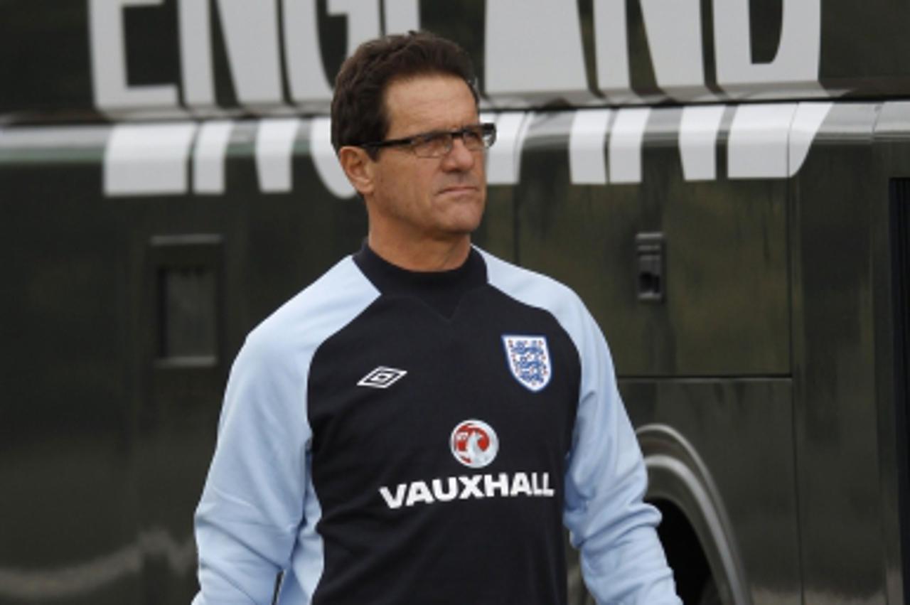 'England manager Fabio Capello arrives for a team training session in London Colney, north of London October 4, 2011. England are due to play Montenegro in a Euro 2012 qualifier in Montenegro on Octob