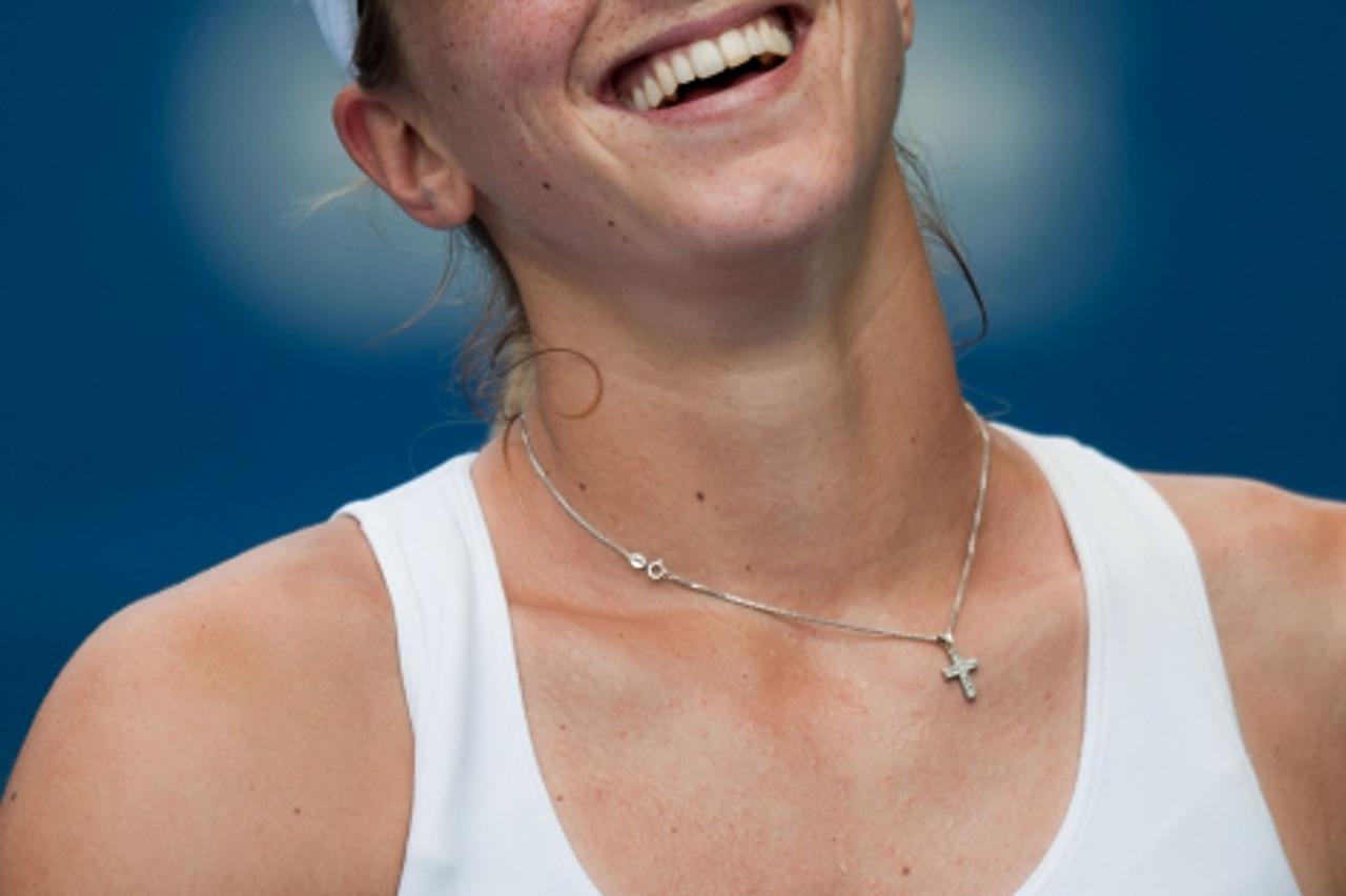 'Petra Martic of Croatia celebrates her win against Jelena Jankovic of Serbia during their semi-final singles match at the BMW Malaysian Open women's tennis tournament in Kuala Lumpur on March 4, 20
