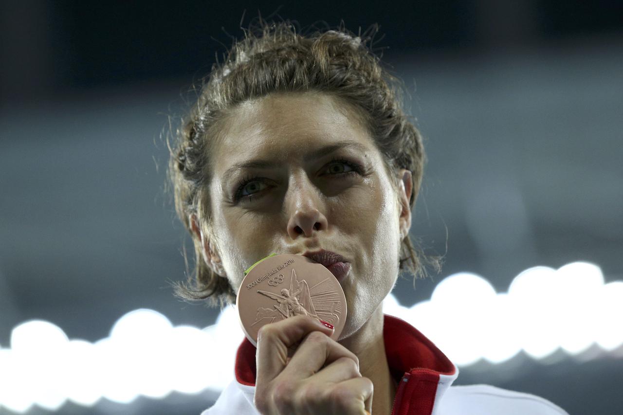 2016 Rio Olympics - Athletics - Victory Ceremony - Women's High Jump Victory Ceremony - Olympic Stadium - Rio de Janeiro, Brazil - 20/08/2016.   Blanka Vlasic (CRO) of Croatia celebrates with her bronze medal.    REUTERS/Dylan Martinez   FOR EDITORIAL USE