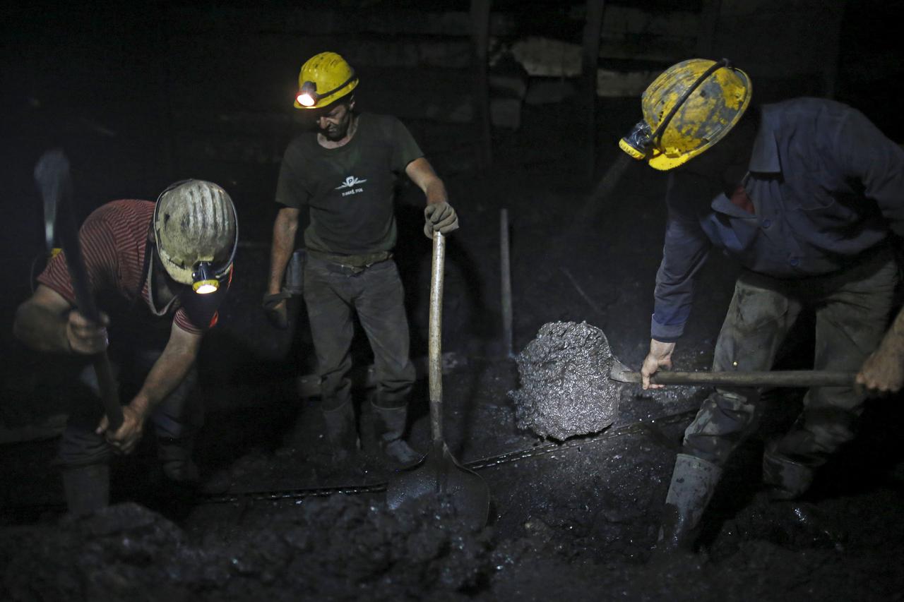 Miners work 740 meters (2427 feet) deep inside the Stara Jama coal mine, in Zenica, Bosnia and Herzegovina, July 15, 2015. Picture taken July 15, 2015. REUTERS/Dado Ruvic