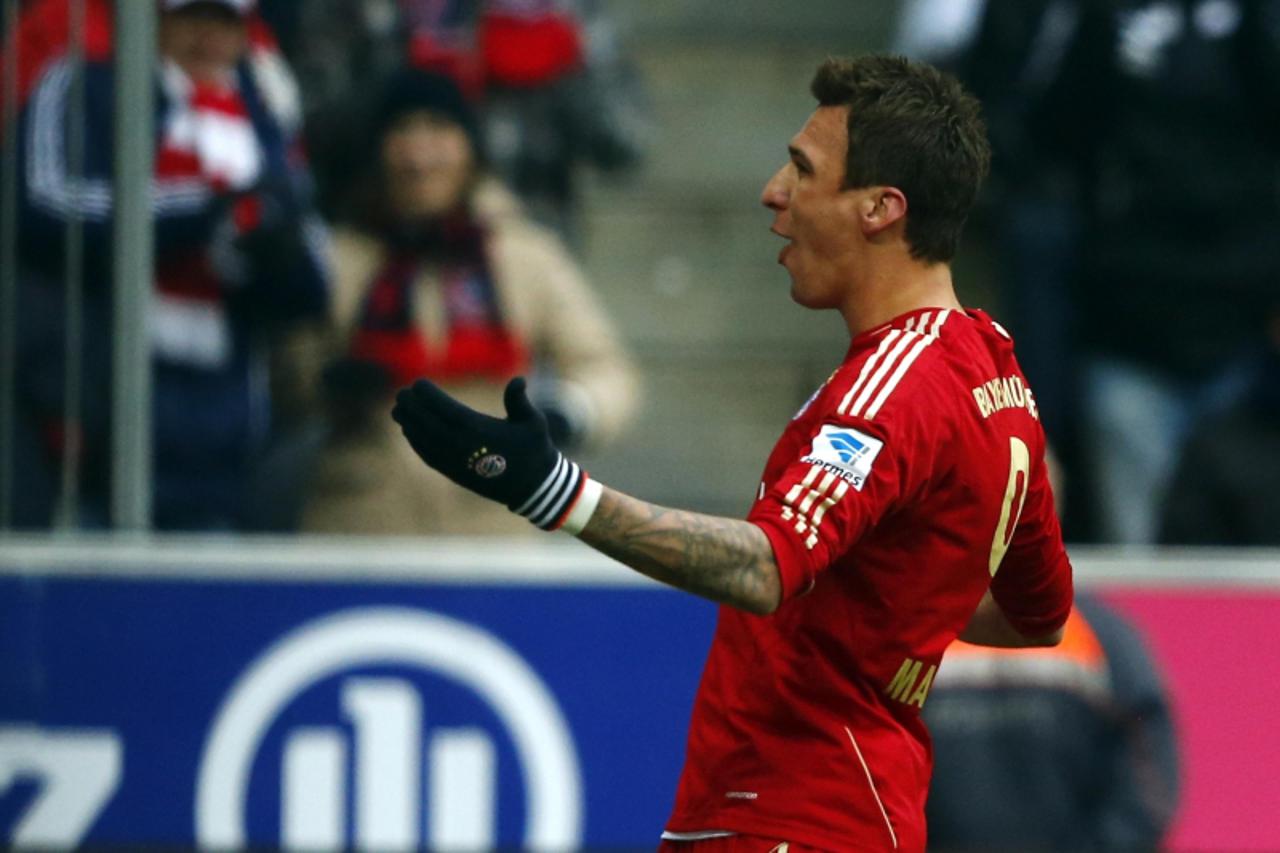 'Bayern Munich's Mario Mandzukic celebrates a goal against Greuther Fuerth during their German Bundesliga first division soccer match in Munich January 19, 2013.     REUTERS/Michael Dalder(GERMANY - 