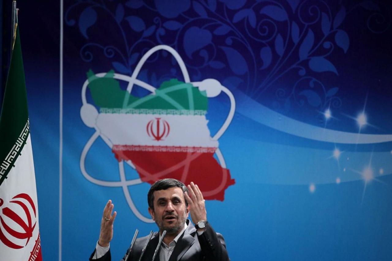 'A picture released by the official website of the Iranian presidency shows President Mahmoud Ahmadinejad delivering a speech to the Iran\'s Atomic Energy Organisation scientists during a ceremony to 
