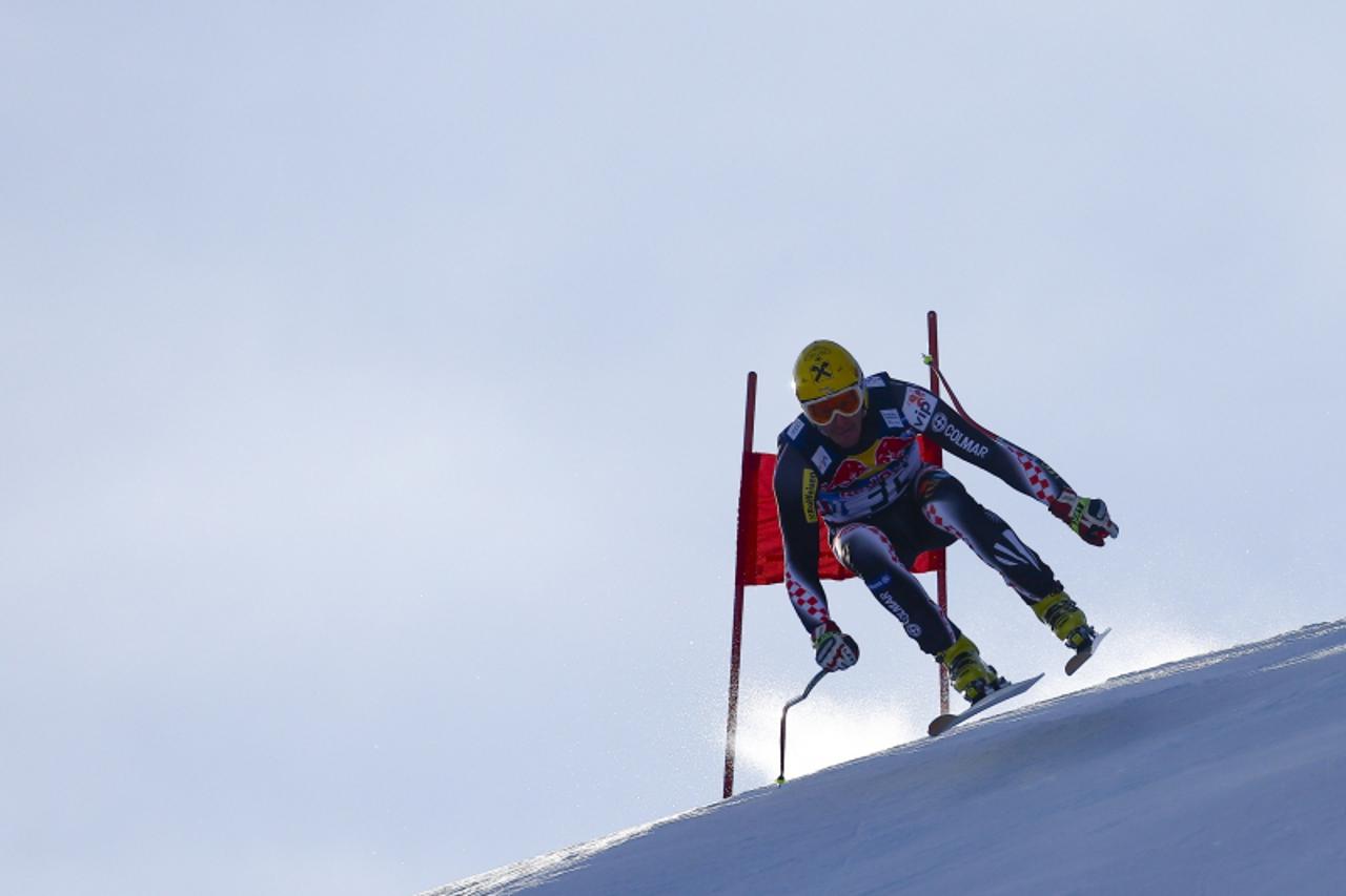 'Ivica Kostelic of Croatia speeds down the course during the third training for the Alpine Skiing World Cup downhill ski race in Kitzbuehel January 24, 2013. REUTERS/ Dominic Ebenbichler (AUSTRIA - Ta