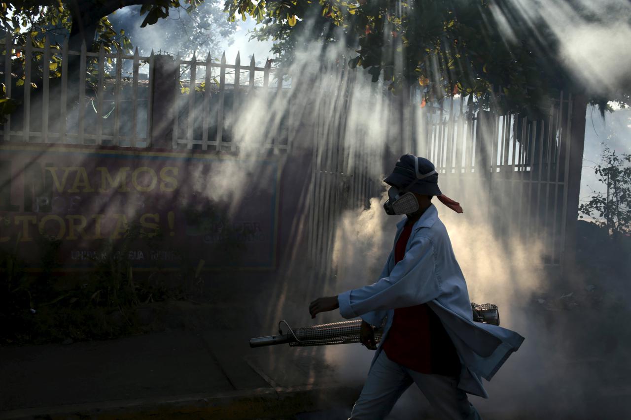 A health ministry worker fumigates a house to kill mosquitoes during a campaign against dengue and chikungunya and to prevent the entry of Zika virus in Managua, Nicaragua January 26, 2016. The Government of Nicaragua announced a plan in order to stop the