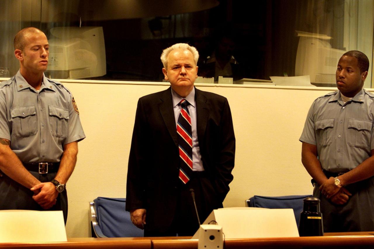\'Former president of Yugoslavia Slobodan Milosevic appears for the court of the International Crime Tribunal in The Hague, October 29, 2001. Milosevic made his third appearance at the United Nations 