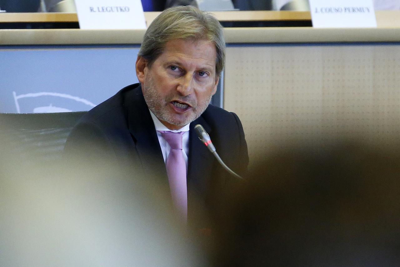 European Neighbourhood Policy and Enlargement Negotiations Commissioner-designate Johannes Hahn of Austria addresses the European Parliament's Committee on Foreign Affairs, at the EU Parliament in Brussels September 30, 2014.        REUTERS/Yves Herman (B
