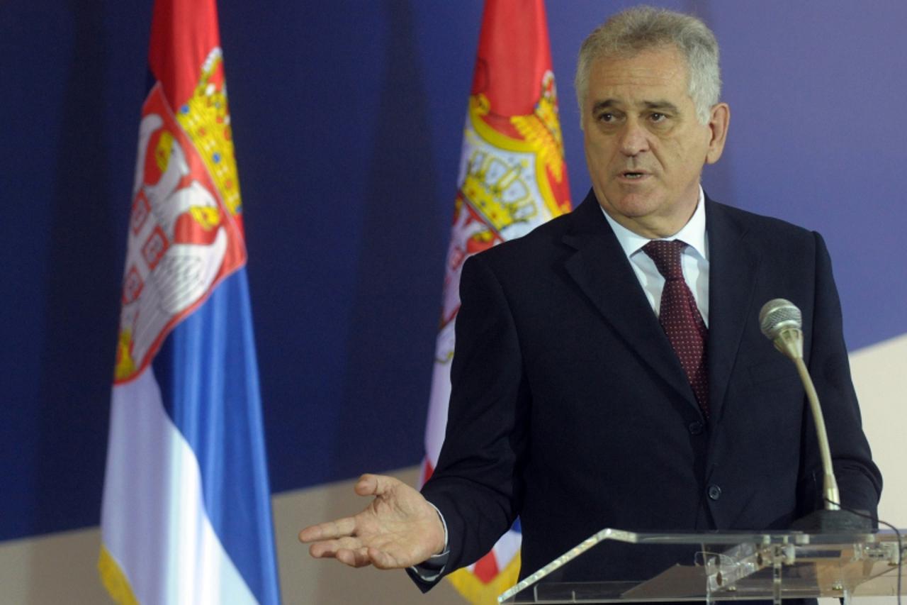 'Serbian President Tomislav Nikolic speaks during a joint press conference with the Serbian Socialist leader after their meeting  in Belgrade on June 28, 2012. Serbian Socialist leader Ivica Dacic rec
