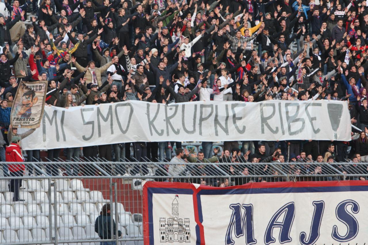 \'26.02.2011., Poljud, Split - Nogometna utakmica 19. kola Prve HNL izmedju NK Hajduk i NK Inter Zapresic. Srdele na atletskoj stazi uz transparent  MI SMO KRUPNE RIBE. Photo: Ivo Cagalj/PIXSELL\'