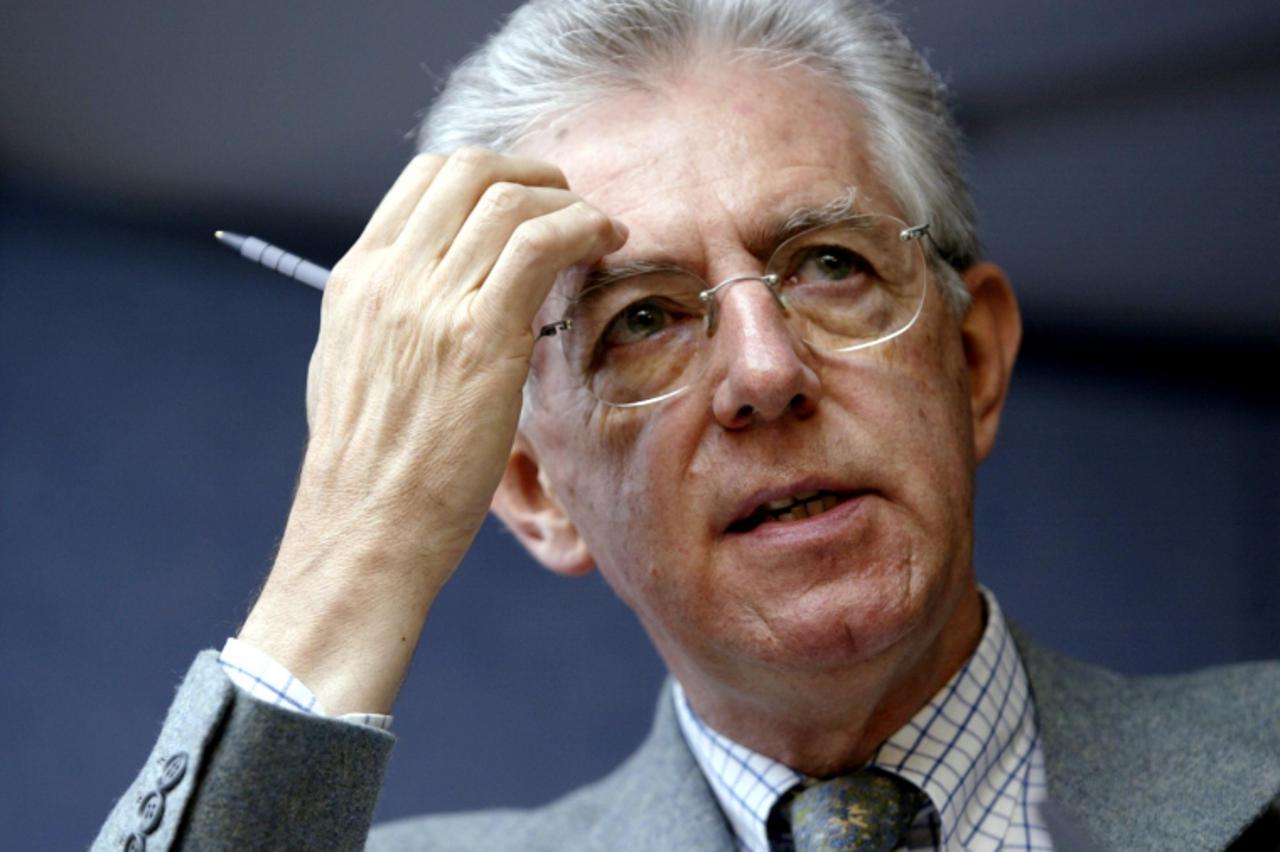 'European Competition Commissioner Italian Mario Monti holds a press conference on Alstom at the European Union headquarters in Brussels 26 May 2004. Monti said 26 May he was preparing to clear the wa
