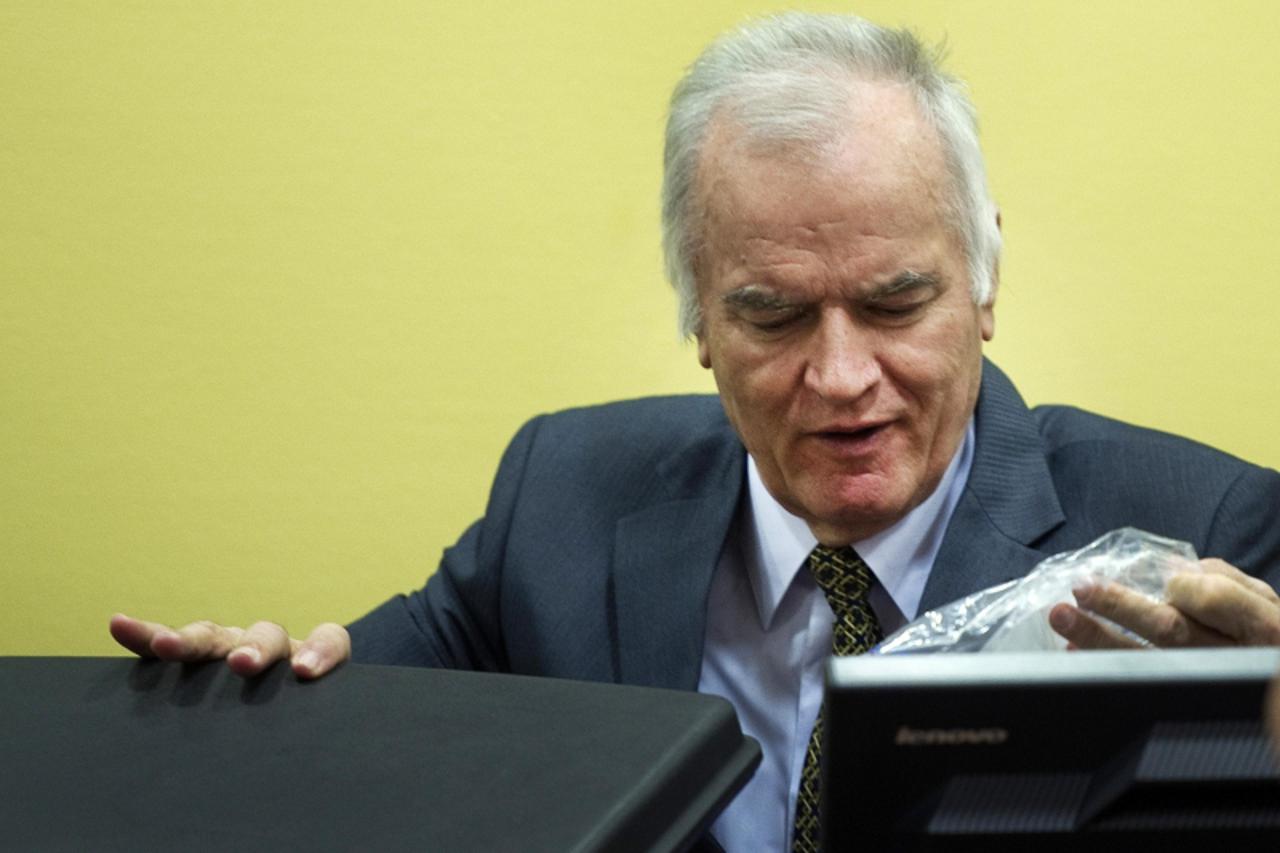 'Former Bosnian Serb army commander Ratko Mladic attends his trial at the International Criminal Tribunal for the former Yugoslavia (ICTY) at The Hague May 16, 2012. Mladic, 70, appeared on Wednesday 