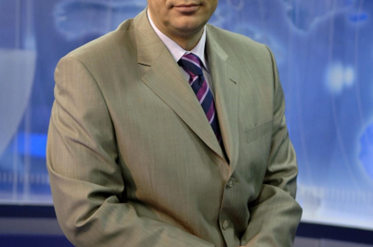 'ekran...zagreb...15.03.2007. htv, prisavlje 3, dnevnik, zoran sprajc,  foto: goran stanzl'