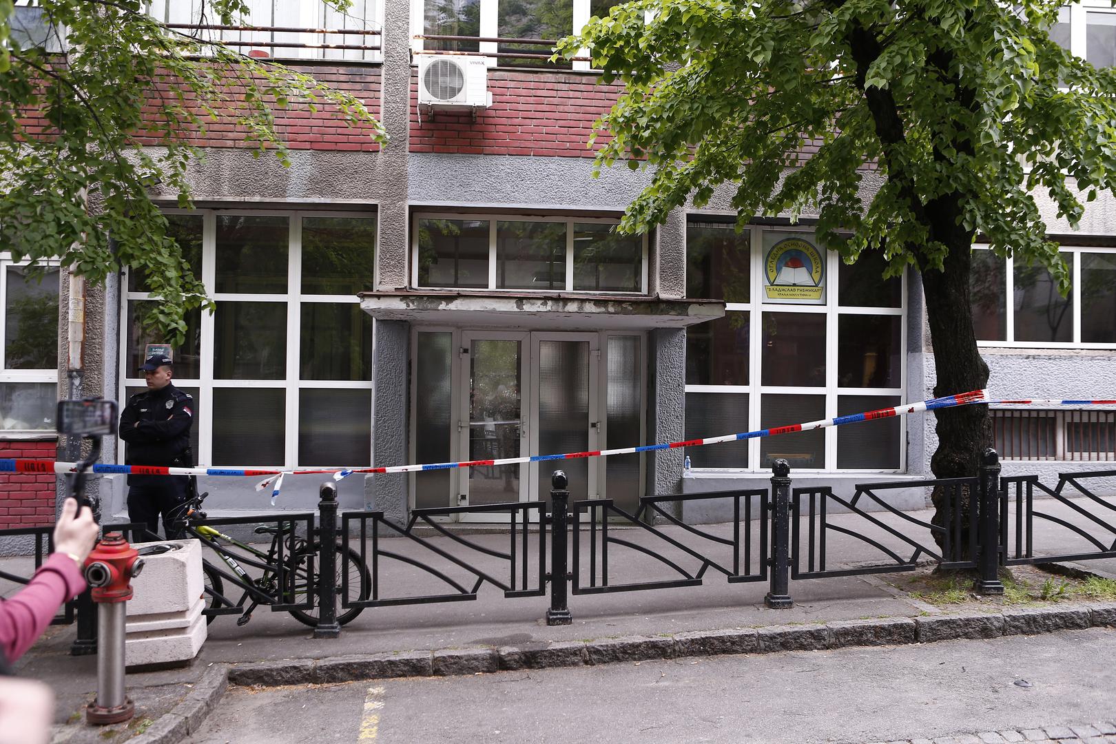 03, May, 2023, Belgrade - The entrance to the "Vladislav Ribnikar" Elementary School, where a tragedy occurred this morning when a seventh-grade student killed eight students and a worker, was secured. Photo: Amir Hamzagic/ATAImages03, maj, 2023, Beograd - Ulaz u Osnovnu skolu "Vladislav Ribnikar” gde se jutros desila tragedija kada je ucenik sedmog razreda ubio osam ucenika i radnika obezbedjena. Photo: Amir Hamzagic/ATAImages Photo: Amir Hamzagic/ATAImages/PIXSELL
