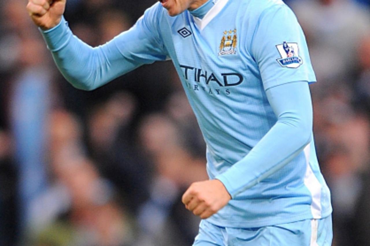 'Manchester City\'s Edin Dzeko celebrates after scoring his team\'s opening goal   Photo: Press Association/Pixsell'